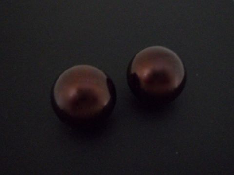 71794-0 Ohrclip in zeitlosem Design mit braunen, synthetischen Zuchtperlen und silberfarbenen Elementen, Hersteller Juwelier Harnisch, elegantes Schmuckstück.