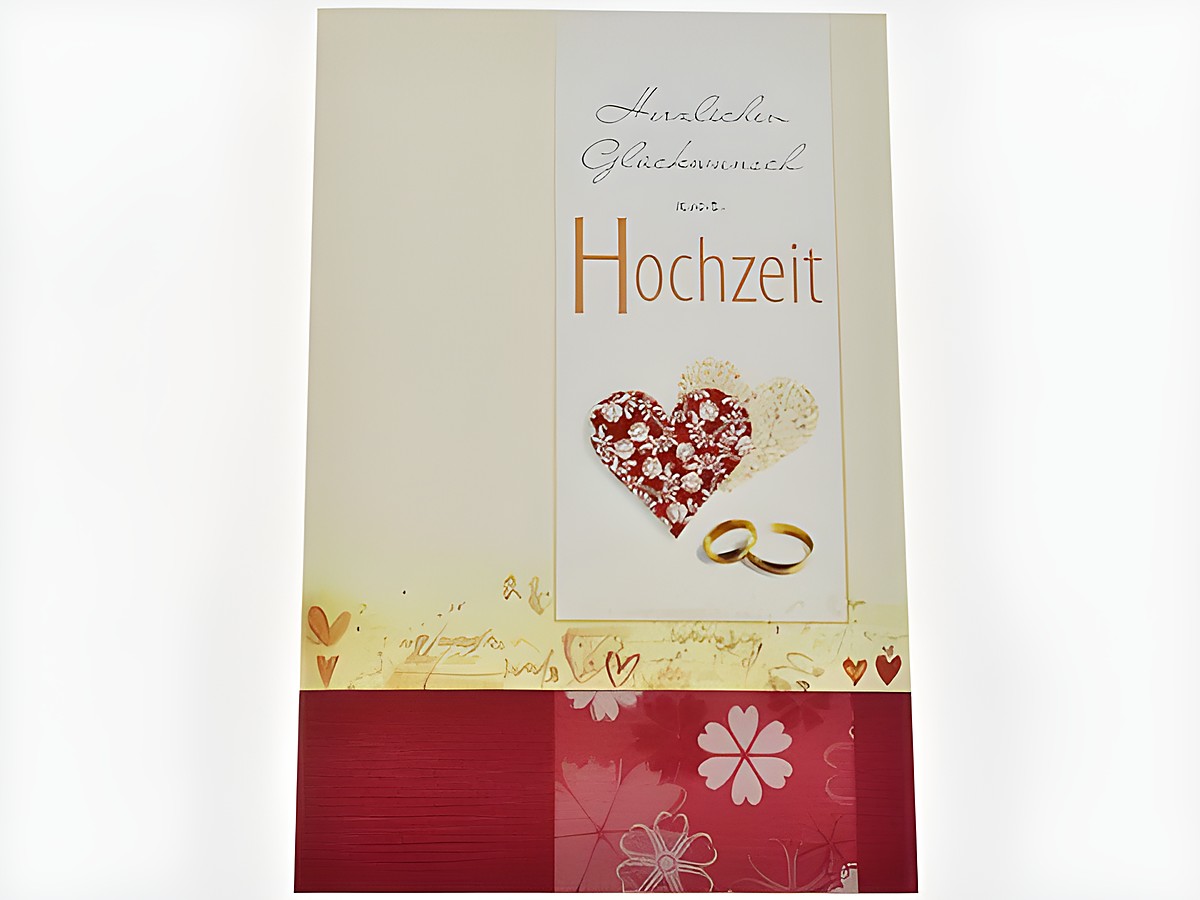 Hochzeitskarte mit dekorativen Herzen und Eheringen, in sanften Farben gehalten, mit dem Schriftzug Herzlichen Glückwunsch zur Hochzeit, Hersteller Juwelier Harnisch.