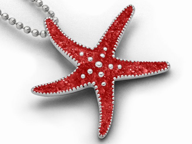 Sterling Silber Anhänger in Form eines Seesterns mit roter Koralle und kleinen, weißen Details, elegant an einer silbernen Kette. Hersteller DUR, Modell P4253.