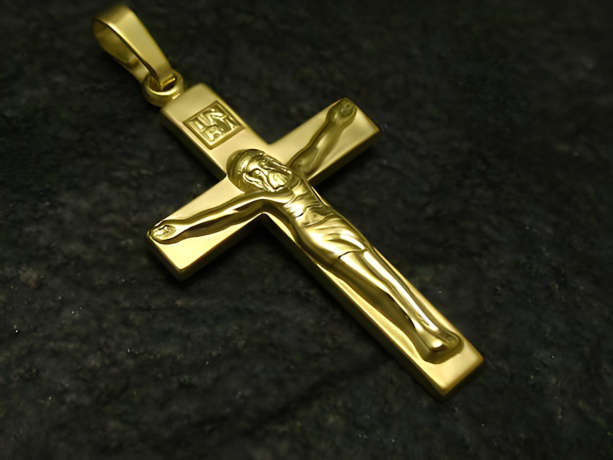 Jesus Kreuz Goldanhänger teilmattiert aus Gold 333, gefertigt vom Juwelier Harnisch, zeigt eine detaillierte Abbildung von Jesus am Kreuz in edlem Design.