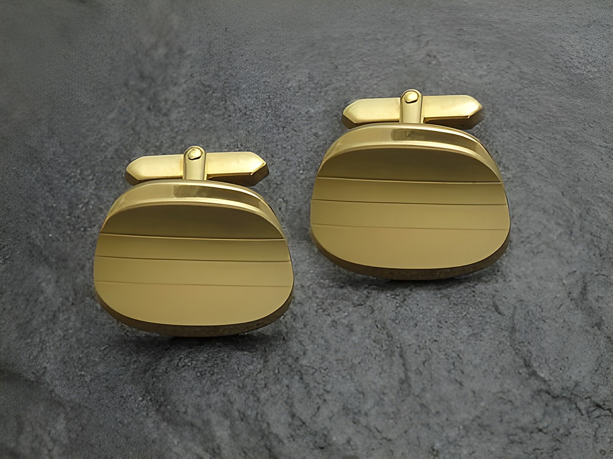 Manschettenknöpfe gewölbt - vergoldet - Design - cufflinks, Hersteller: Juwelier Harnisch, goldfarben, elegante Form mit feinen Linien für einen stilvollen Akzent.