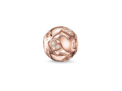 Silberner Karma Bead von Thomas Sabo in vergoldetem Roségold mit Zirkonia, verziert mit liebevollen Lovebirds-Motiven und einem elegant geschwungenen Design.