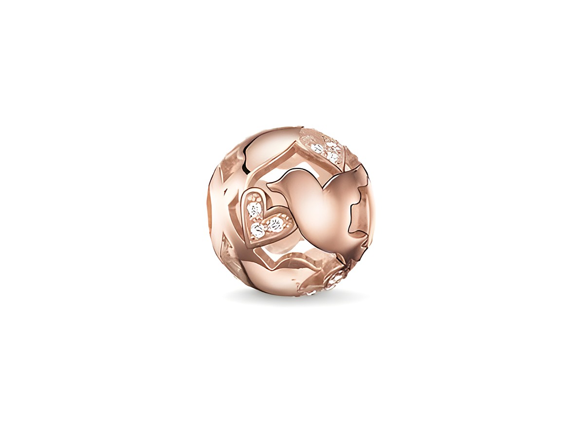 Silberner Karma Bead von Thomas Sabo in vergoldetem Roségold mit Zirkonia, verziert mit liebevollen Lovebirds-Motiven und einem elegant geschwungenen Design.