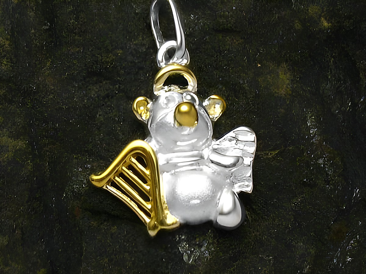 Niedlicher Engel mit Harfe aus sterling Silber und goldener Akzentierung, hergestellt von Juwelier Harnisch, perfekt als Anhänger für Schmuckliebhaber.