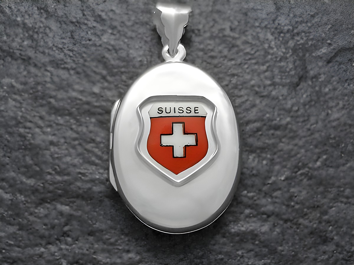 Silbernes Medaillon mit dem Wappen der Schweiz, rot mit weißem Kreuz und der Aufschrift Suisse, hergestellt von Juwelier Harnisch, Europa Medaillons. Ideal für Sammler oder als Geschenk.