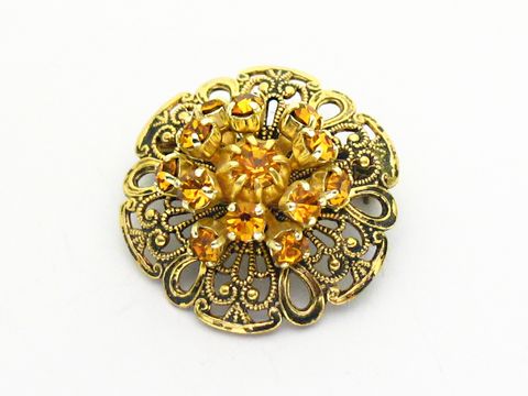 Damen Brosche im Sexy City Look in Gelb, rund, Hersteller: Juwelier Harnisch, Strass Brosche in Gelb und Braun mit filigranem Design und glitzernden Steinen, ideal für elegante Outfits.