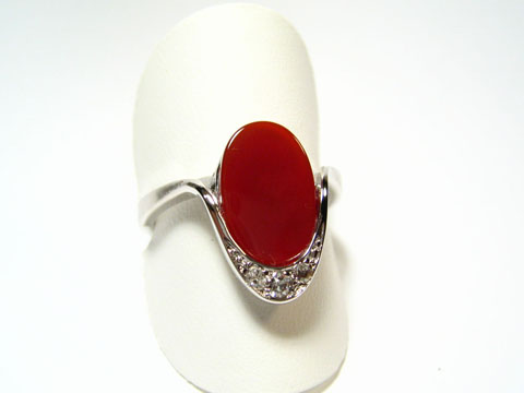 Silber Ring rhodiniert mit rot braunem Karneol im 70er Look, Hersteller Juwelier Harnisch, verstellbar, elegantes Design mit auffälligem Stein und dezenter Verzierung.