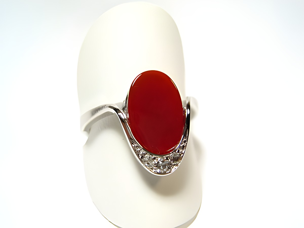Silber Ring rhodiniert mit rot braunem Karneol im 70er Look, Hersteller Juwelier Harnisch, verstellbar, elegantes Design mit auffälligem Stein und dezenter Verzierung.