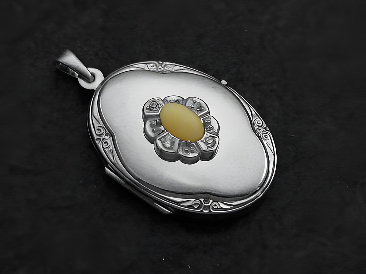 Koralle weiß Medaillon Cabochon aus Sterling Silber mit Brillanten, Hersteller Juwelier Harnisch, elegantes Design, feine Verarbeitung, ideal als Schmuckstück oder Geschenk.