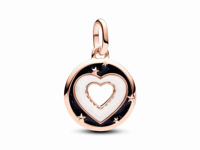 Herzen Medaillon-Charm von Pandora ME in Roségold vergoldet mit synthetischem Perlmutt in Weiß, umgeben von einem schwarzen Rand und kleinen Sternen, ideal für persönliche Styles.