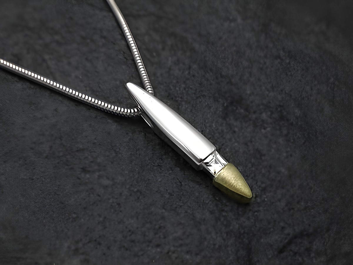 Anhänger inklusive Kette aus Sterling Silber in bicolor mit Zirkonia, modernes Design und elegante Ausstrahlung, Hersteller Juwelier Harnisch, ideal als Schmuckstück für besondere Anlässe.