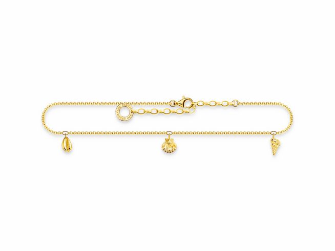 Die Thomas Sabo Fußkette AK0037-413-39-L27V aus vergoldetem Sterlingsilber hat eine Länge von 27 cm und ist verstellbar, verziert mit Muschel- und Schneckenanhängern.