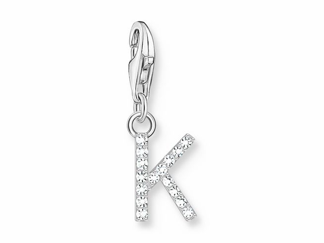 Silberner Charm-Anhänger in Form des Buchstabens K, besetzt mit funkelndem weißen Zirkonia, von Thomas Sabo, inklusive Clipverschluss für individuelles Styling.