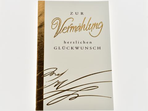 Hochzeitskarte mit feiner Struktur und goldener Schrift, Aufschrift zur Vermählung herzlichen Glückwunsch, Hersteller Juwelier Harnisch, ideal für Hochzeitsgrüße.