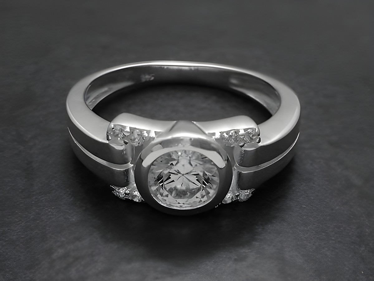 Funkeltraum Sterling Silber Ring poliert mit Zirkonia, Hersteller Juwelier Harnisch, über Größe 60 / 19,1, im Bild ein eleganter Ring mit einem runden, glänzenden Zirkonia-Stein in der Mitte.