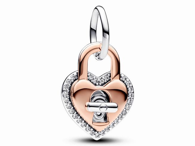 Drehbarer Charm-Anhänger in Form eines Herz-Schlosses aus rosévergoldetem und silbernem Metall mit klaren Zirkonia. Ideal als Geschenk zum Valentinstag.
