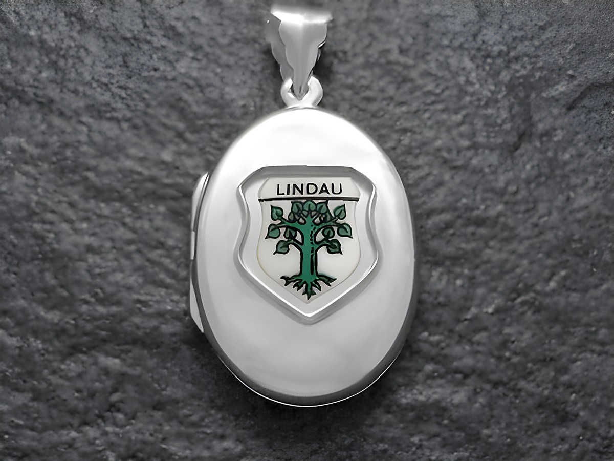 Silbernes Medaillon mit dem Stadtwappen von Lindau, verziert mit einem grünen Baum und dem Schriftzug Lindau, hergestellt von Juwelier Harnisch aus Schleswig-Holstein.