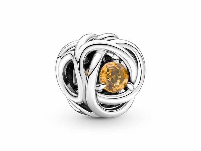 Pandora Honig Eternity Kreis Charm aus Silber mit einem gelben Kristall in der Mitte, umgeben von kunstvollen, miteinander verflochtenen Silbersträngen, glänzend und elegant.