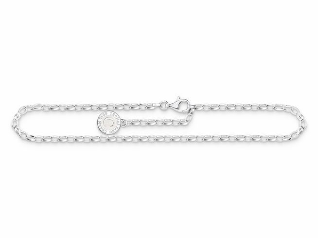 Silberne Fußkette von Thomas Sabo mit einem charmierenden Anhänger und einem eleganten Schließmechanismus. Die Kette ist 26 cm lang und enthält farbige Emaille.