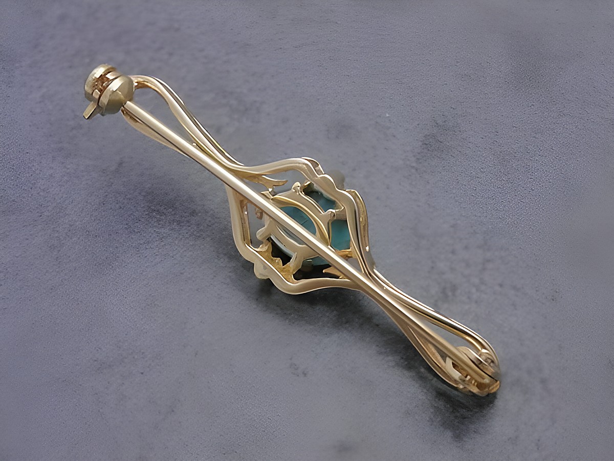 Gold auf Silber Brosche mit filigranem Design und türkisem Stein, Hersteller: Juwelier Harnisch, elegant und vornehm, ideal für besondere Anlässe. – Ansicht 2