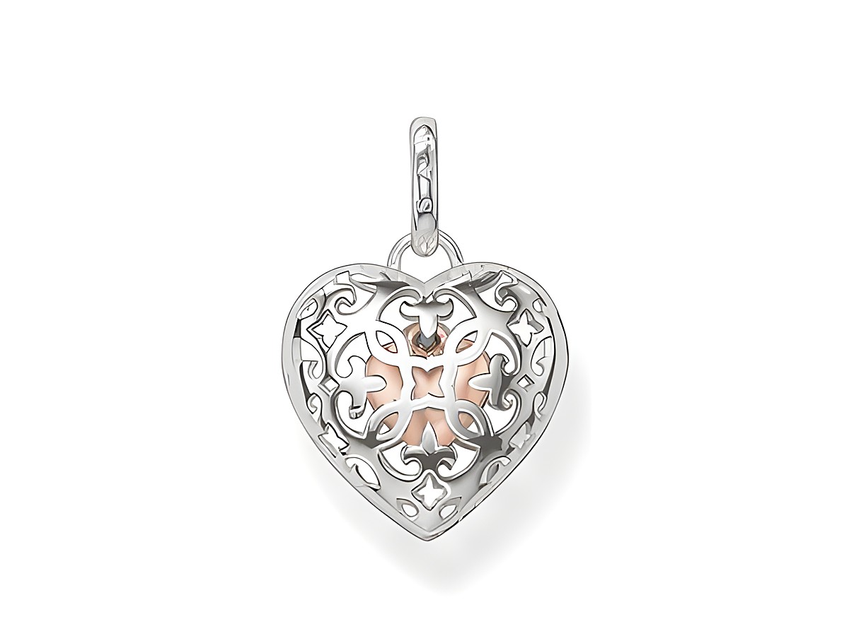 Medaillon von Thomas Sabo in Herzform aus Silber mit vergoldetem Roségold-Innenleben, filigranes Design und Anhänger, ideal für persönliche Gravuren oder als Schmuckstück.