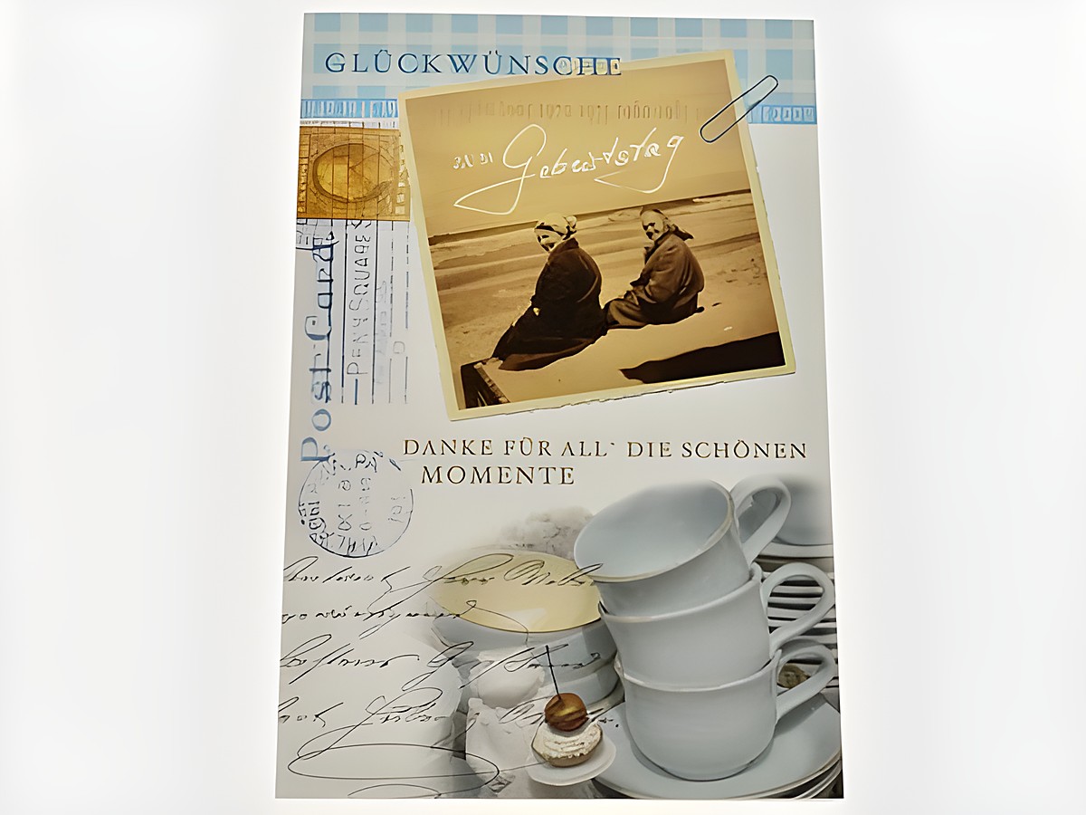 Eine Geburtstagskarte mit dem Motiv zweier Damen am Meer und der Aufschrift Glückwünsche zu deinem Geburtstag, gestaltet von Juwelier Harnisch.