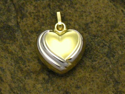 Bicolor Herzanhänger aus Gold mit plastischer Gestaltung, hergestellt von Juwelier Harnisch, ideal als liebevolles Schmuckstück.