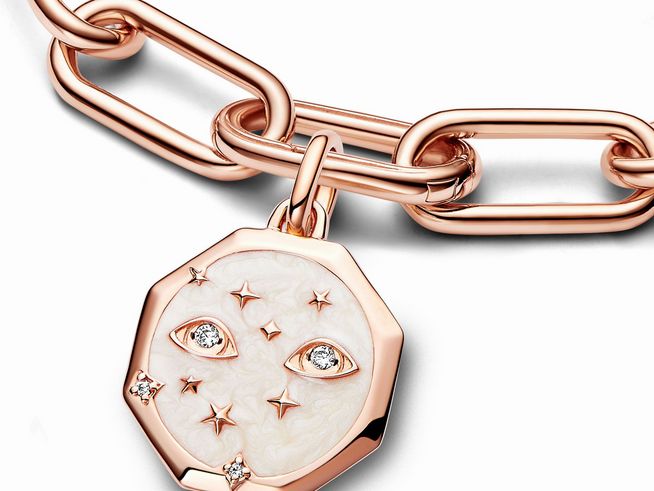 Pandora ME Medaillon-Charm mit funkelnden Augen in Roségold Vergoldung, Zirkonia und weißer Emaille, ideal für individuelle Armbänder und besondere Momente.