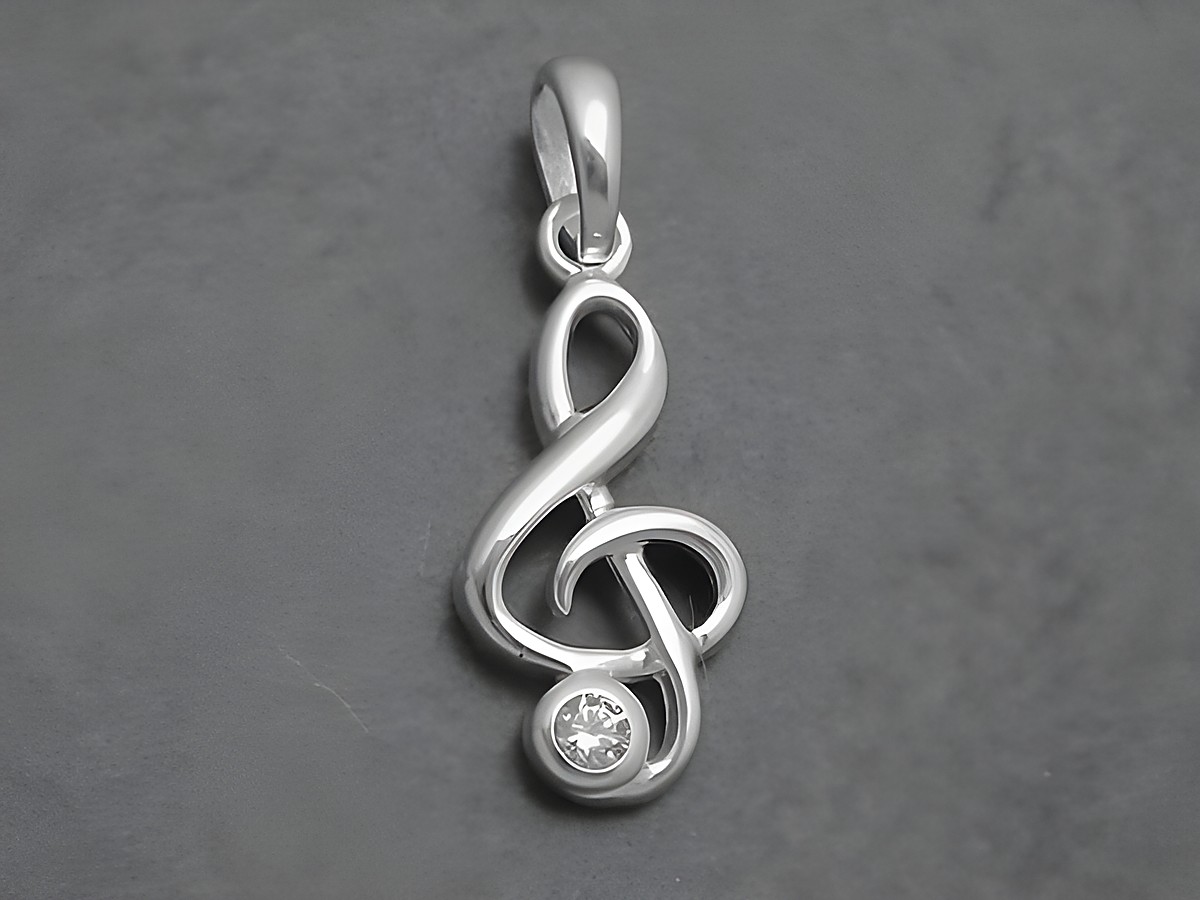 Silber Anhänger in Form eines Violinschlüssels mit einem weißen Zirkonia, Hersteller Juwelier Harnisch, ideal für Musikliebhaber.