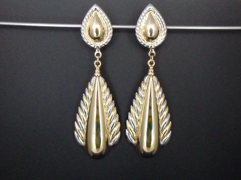 Ohrclip - 82,8 mm - zeitlos - gold- und silberfarben, Hersteller: Juwelier Harnisch, mit einem eleganten Design aus geschwungenen Formen und feinen Details.