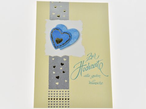 Hochzeitskarte in Gelb mit blauen Herzen und goldenen Akzenten, beschriftet mit 'Zur Hochzeit alle guten Wünsche', hergestellt von Juwelier Harnisch.