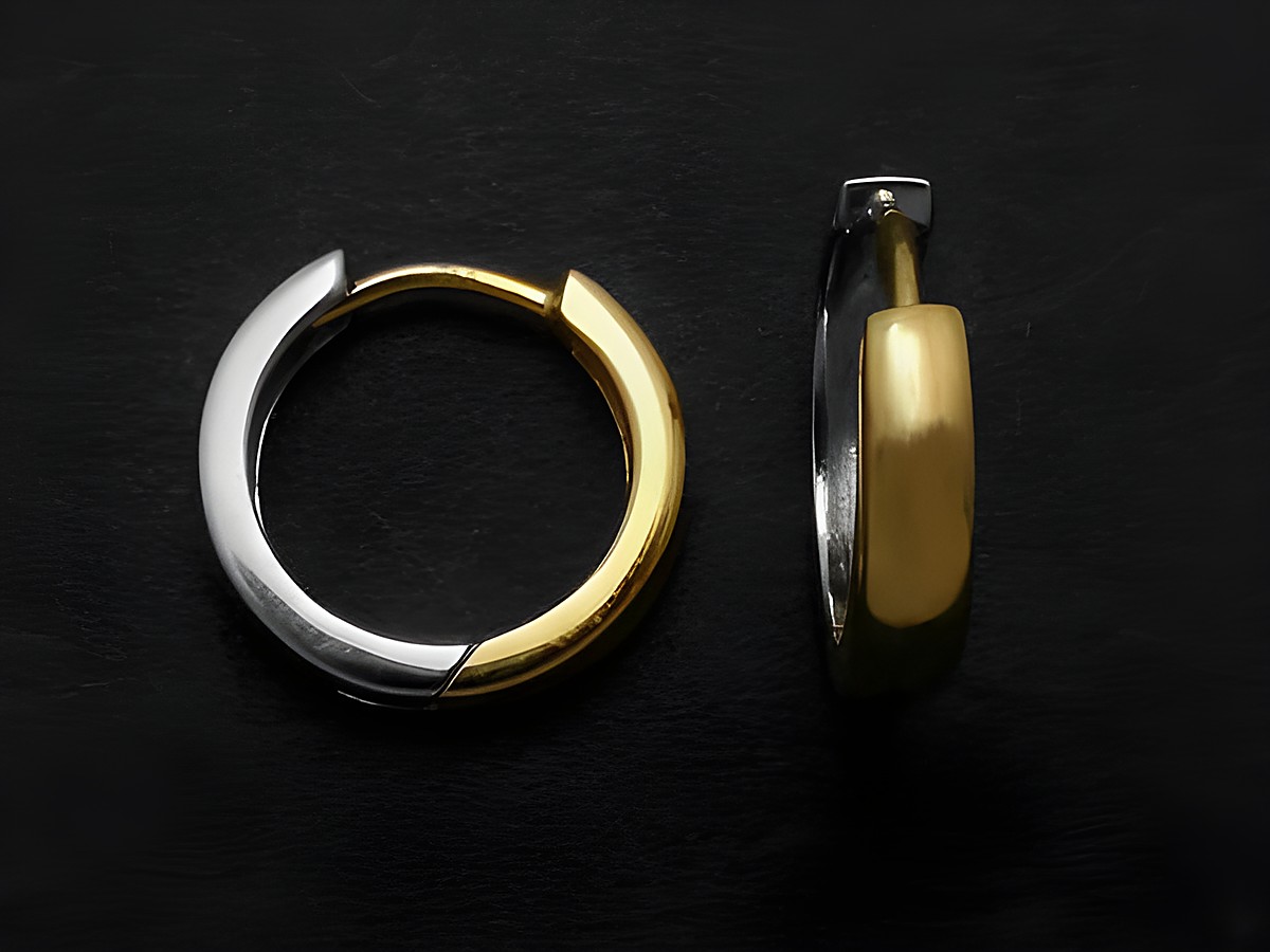 Creolen BICOLOR aus 375 Gelbgold und Weißgold, Scharniercreolen mit Durchmesser von 1,1 cm, Hersteller Juwelier Harnisch, elegant und zeitlos im Design.