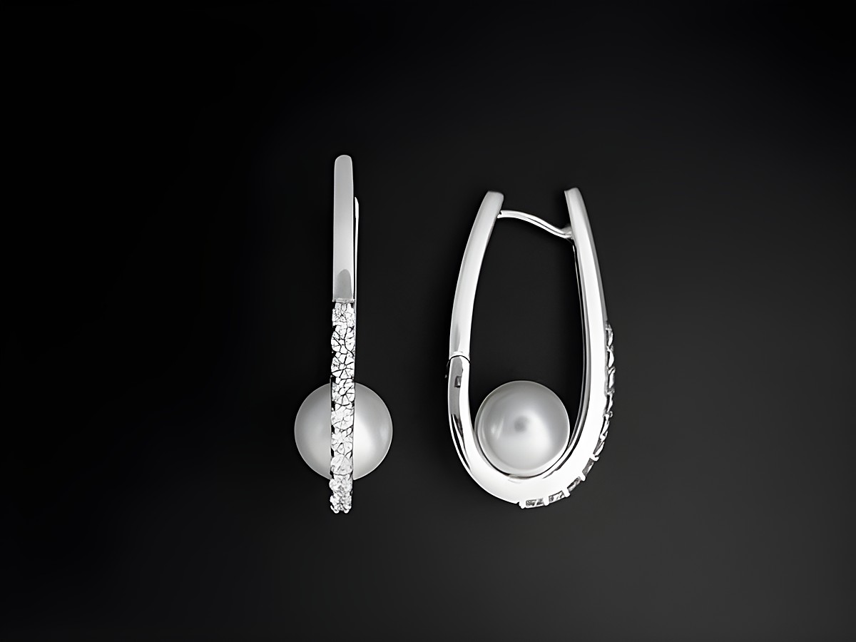 Creolen aus 925 Sterling Silber mit Zirkonia und Perle Imitation von Juwelier Harnisch, elegant designt und ideal für festliche Anlässe, strahlen zeitlose Schönheit aus.