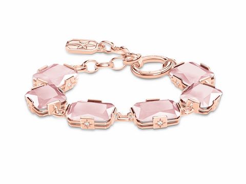 Elegantes Thomas Sabo Armband aus Silber und Roségold mit pinken, facettierten Steinen, verziert mit einer filigranen Verarbeitung, in einer flexiblen Längenverstellung von 14 bis 19 cm.
