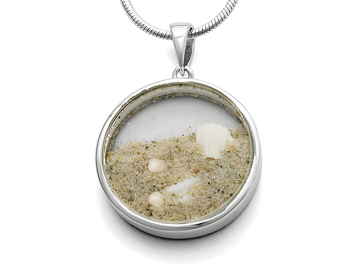 DUR Anhänger Sandsturm P2936 aus Sterling Silber mit einer Kapsel, die feinen Sand und Muscheln zeigt, perfekt für einen maritimen Look.