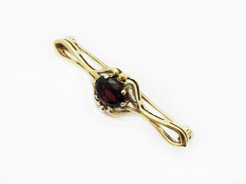 Granat Brosche 41 mm - edel Silber vergoldet mit einem ovalen Granat in filigraner Fassung, hergestellt von Juwelier Harnisch. Elegantes Design für stilvolle Akzente.