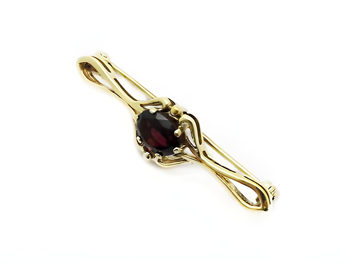 Granat Brosche 41 mm - edel Silber vergoldet mit einem ovalen Granat in filigraner Fassung, hergestellt von Juwelier Harnisch. Elegantes Design für stilvolle Akzente.