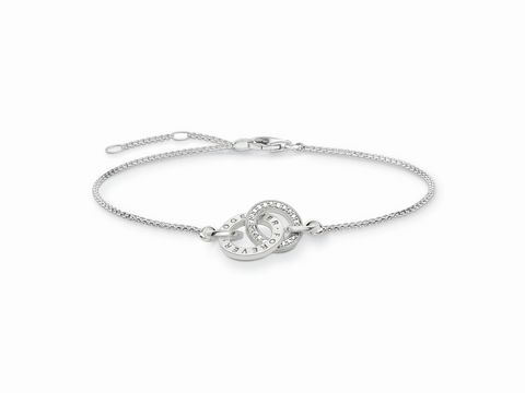 Elegantes Thomas Sabo Armband aus 925 Sterling Silber, längenverstellbar 16,5/18/19,5 cm, mit Zirkonia in Weiß und verzierter Ringschließe. Perfekt für stilvolle Anlässe.