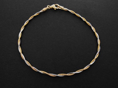 Armband verschlungenes 1,9 x 1,9 mm Gold 585 bicolor diamantiert 19 cm Hersteller Juwelier Harnisch Gold 585 elegant und edel mit glänzenden Oberflächen und spiralförmigem Design.