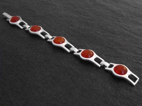Silberarmband extravagant 19 cm Design mit Karneolsteinen, Hersteller Juwelier Harnisch, schlichte Eleganz und besonderen Steinbesatz. Ideal für stilvolle Akzente.