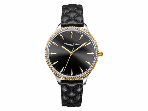 Damenuhr von Thomas Sabo, Modell WA0323-221-203, mit schwarzem Zifferblatt, gold- und silberfarbenem Gehäuse sowie schwarzem, geflochtenem Lederarmband. Elegantes Design für den Rebel at Heart Stil.