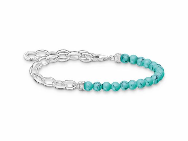 Silbernes Armband von Thomas Sabo mit imitiertem Türkis in leuchtendem Türkis, kombiniert mit dekorativen Gliedern, Länge verstellbar von 16 bis 19 cm.