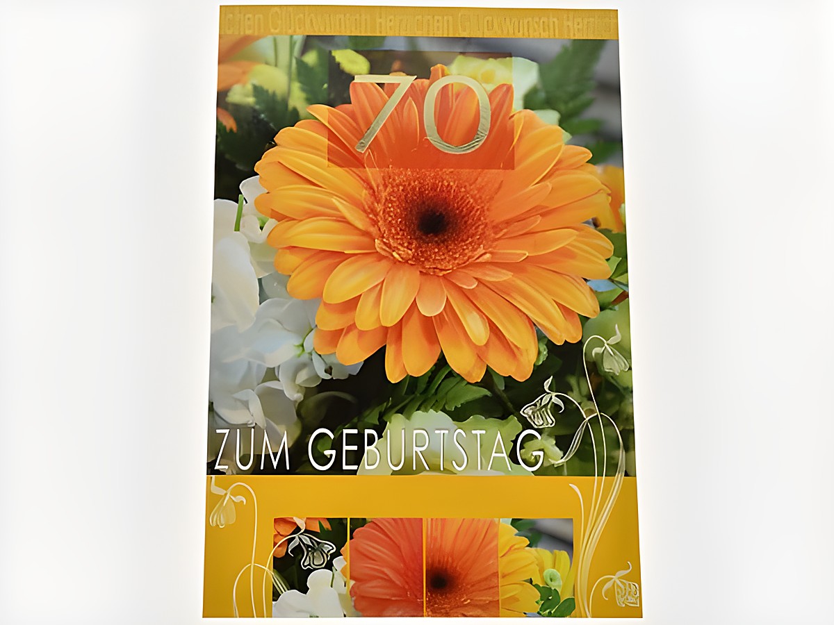Geburtstagskarte mit einer orangefarbenen Gerbera und dem Aufdruck 70 zum Geburtstag, hergestellt von Juwelier Harnisch, in einem ansprechenden Design mit floralen Elementen.