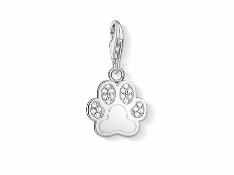 Charm in Form einer Hundepfote aus Silber mit weißen Zirkonia. Ideal für Tierliebhaber, lässt sich an Armbändern oder Ketten befestigen. Hersteller: Thomas Sabo. Modelnummer 1339-051-14.