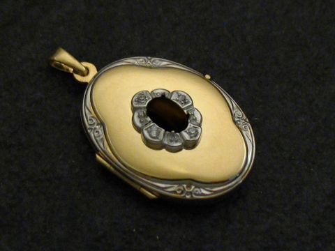 Onyx schwarz Medaillon Cabochon Gold 585 bicolor mit Brillanten, Hersteller Juwelier Harnisch, Gelbgold 585, elegant und zeitlos, ideal als Schmuckstück oder Geschenk.