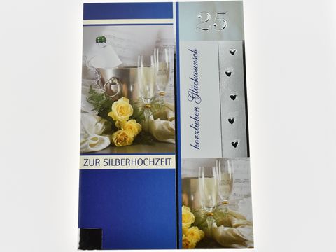 Hochzeitskarte mit einer Sektflasche und Gläsern, umgeben von gelben Rosen und eleganten Stoffen. Hersteller: Juwelier Harnisch, für die Silberhochzeit gestaltet.