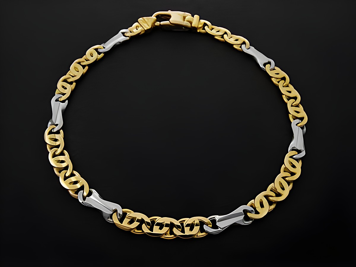 Armband aus Stäbchenpanzer in Gold 750 bicolor, Größe 18,5 cm, gefertigt von Juwelier Harnisch, kombiniert elegantes Design mit hochwertigem Gold 333.