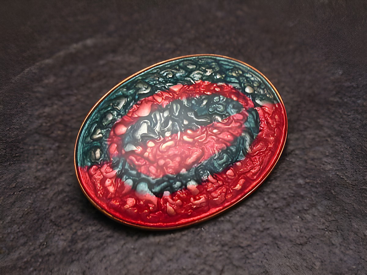Brosche CIRCLE blau-rosa - Emaille vergoldet - VINTAGE von Juwelier Harnisch, exquisite Emaille Brosche mit strukturiertem ovalem Design in Blau und Rosa.