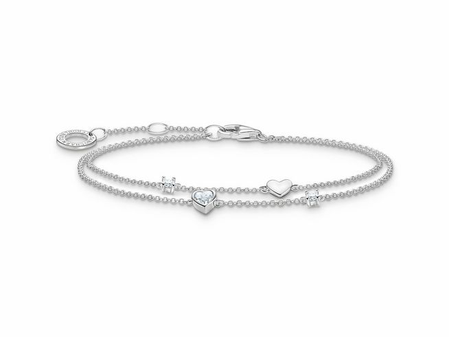 Thomas Sabo Armband A2057-051-14-L19V aus Sterling Silber mit Zirkonia, verziert mit Herz- und Kreuzanhängern, 19 cm verstellbar. Elegantes und zeitloses Schmuckstück.