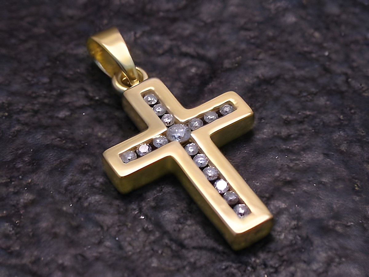 Anhänger Kreuz in Gold 375 mit Zirkonia Steinen, Hersteller Juwelier Harnisch, kunstvoll verarbeitet und glänzend, ideale Ergänzung für jedes Schmuckstück.
